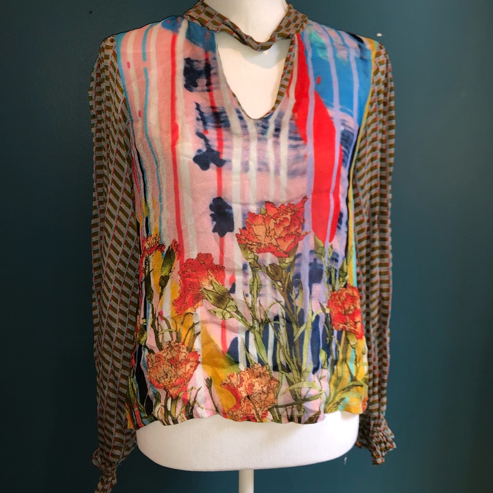 Really fun Anthropologie blouse in size S. Multi colored and light
